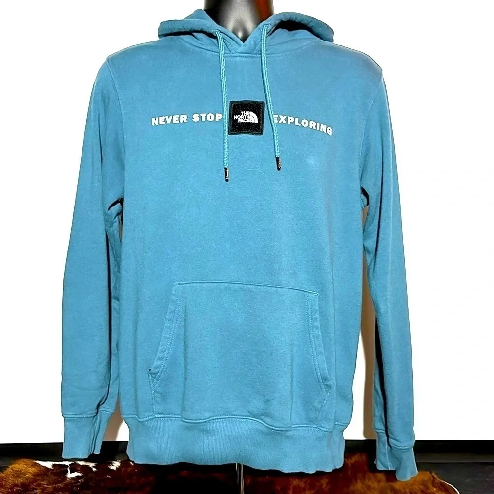 The North Face Men's Blue and Black Hoodie Size Small. Gently Worn.